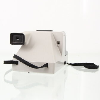 Polaroid SX-70 : The Button