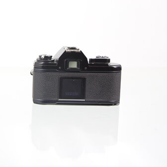 Nikon EM zwarte met Nikon lens series E 50mm 1.8 pancake lens