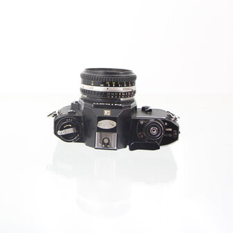 Nikon EM zwarte met Nikon lens series E 50mm 1.8 pancake lens