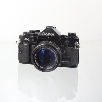 Canon A-1 black 35 MM SLR Camera met lichtsterke Canon lens FD 50mm 1:1.4