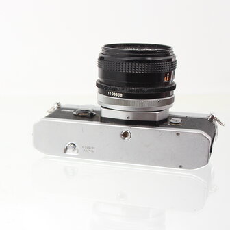 Chrome Canon FTb QL with 50mm 1.8 lens SLR camera