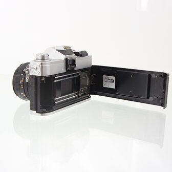 Chrome Canon FTb QL with 50mm 1.8 lens SLR camera