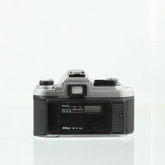 Nikon FG met Nikon Lens Series E 36-72mm f/3.5 Zoomlens