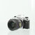 Nikon FG met Nikon Lens Series E 36-72mm f/3.5 Zoomlens