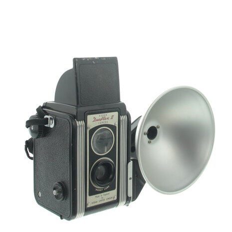 Kodak Duaflex II met  flitslamphouder en draagriem