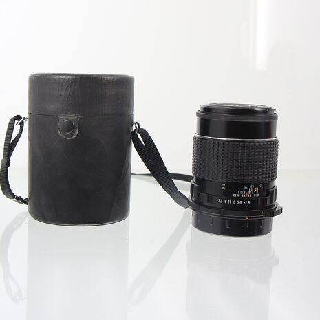 Pentax 67 SMC 165mm f2.8 met koker en lensdoppen