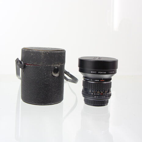 Pentax SMC 15mm f3.5 (K-mount) with koker en lensdoppen