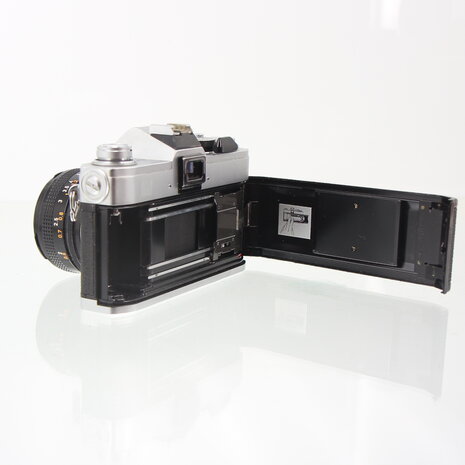 Chrome Canon FTb QL with 50mm 1.8 lens SLR camera
