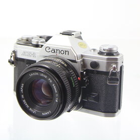 Canon AE-1 35 MM SLR Camera met Canon FD  lens 50mm 1:1.8